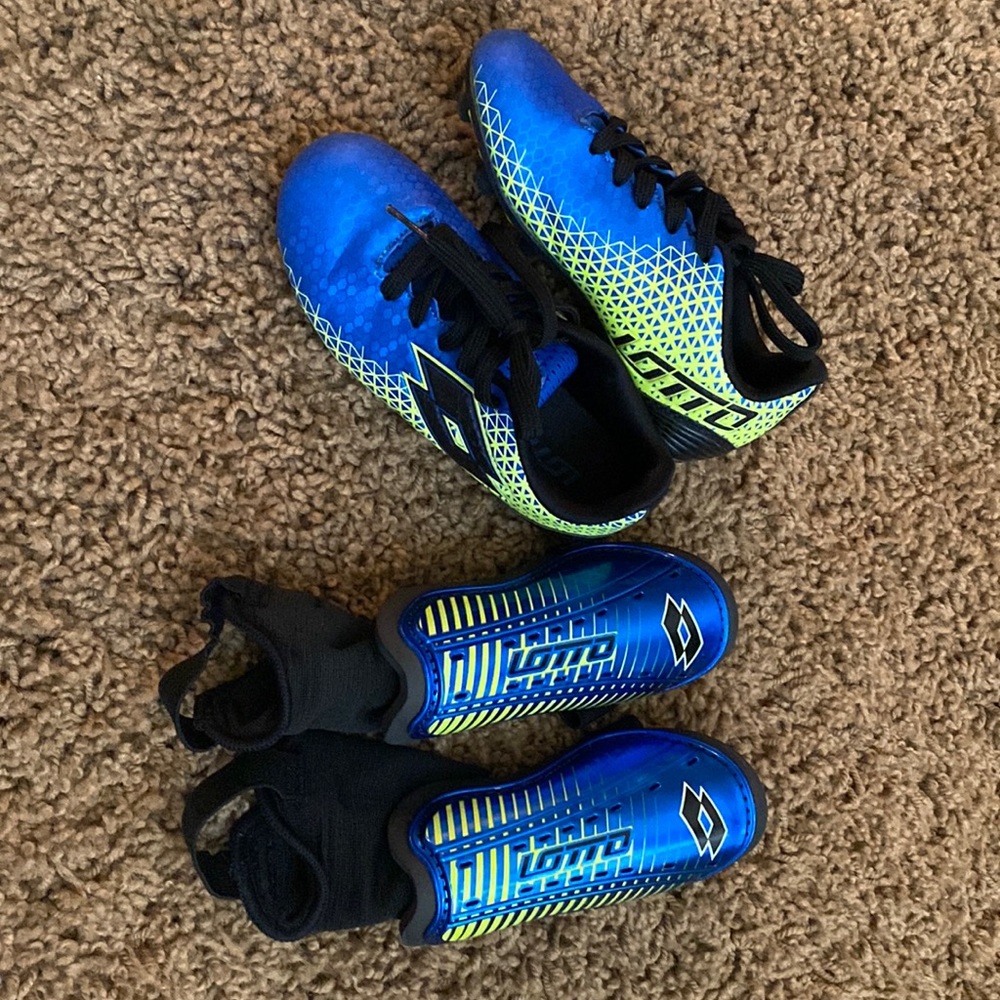 Lotto soccer cleats and shin guards